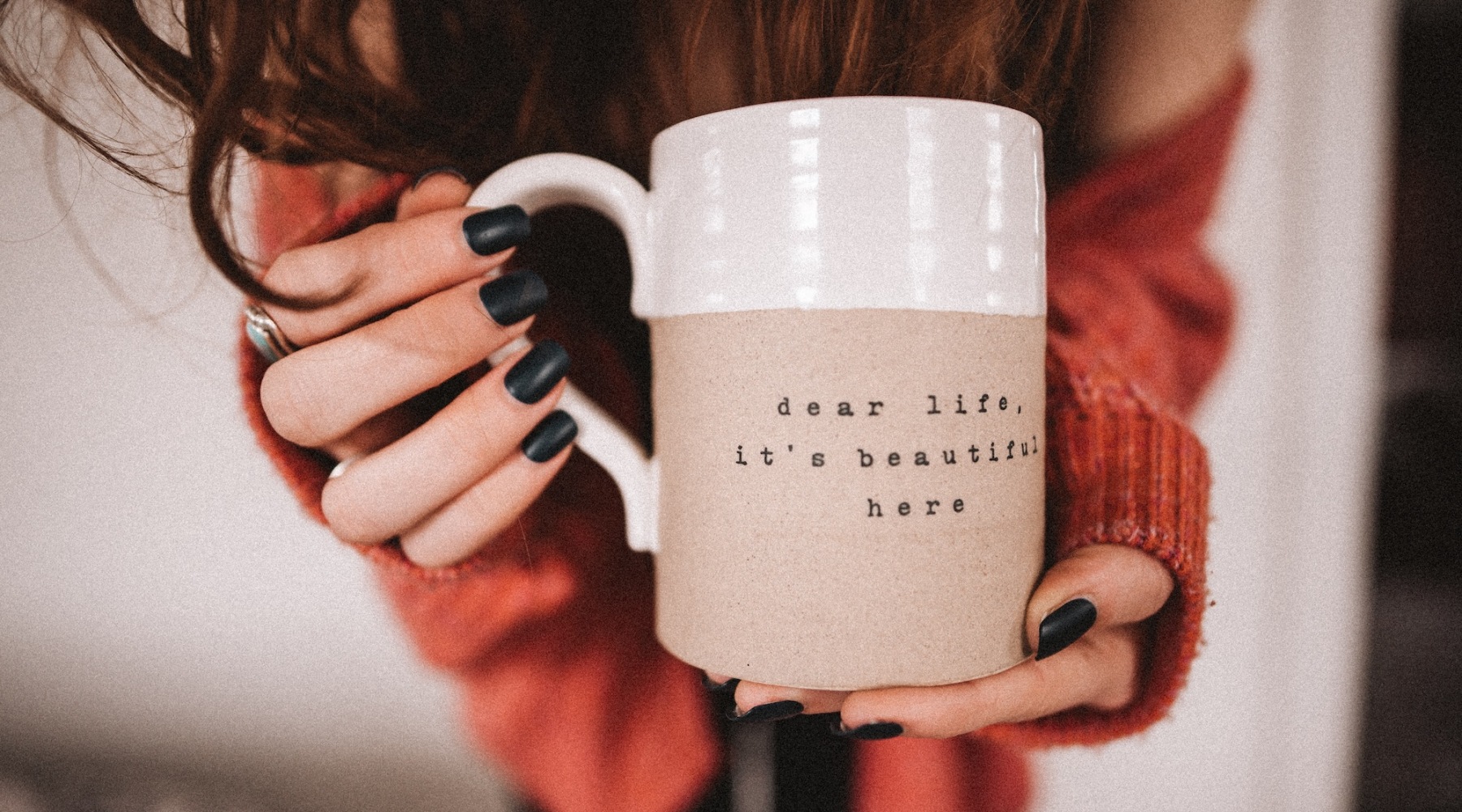 Luxury Portland Apartments Near Downtown a woman holding a mug