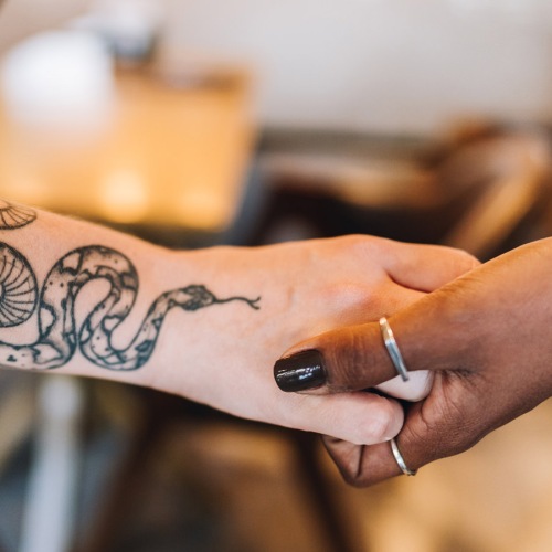 Settle into comfort at Lower Burnside Lofts Two hands hold each other